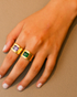 Gold green jade signet ring worn on hand