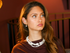 Woman styling Baroque pearl statement earrings
