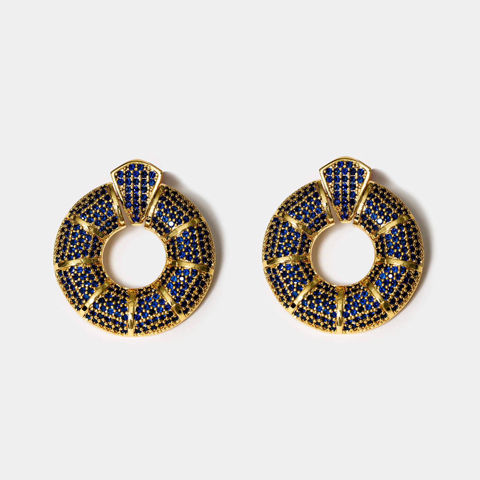 Blue zircon donut hoop earrings in gold-tone finish