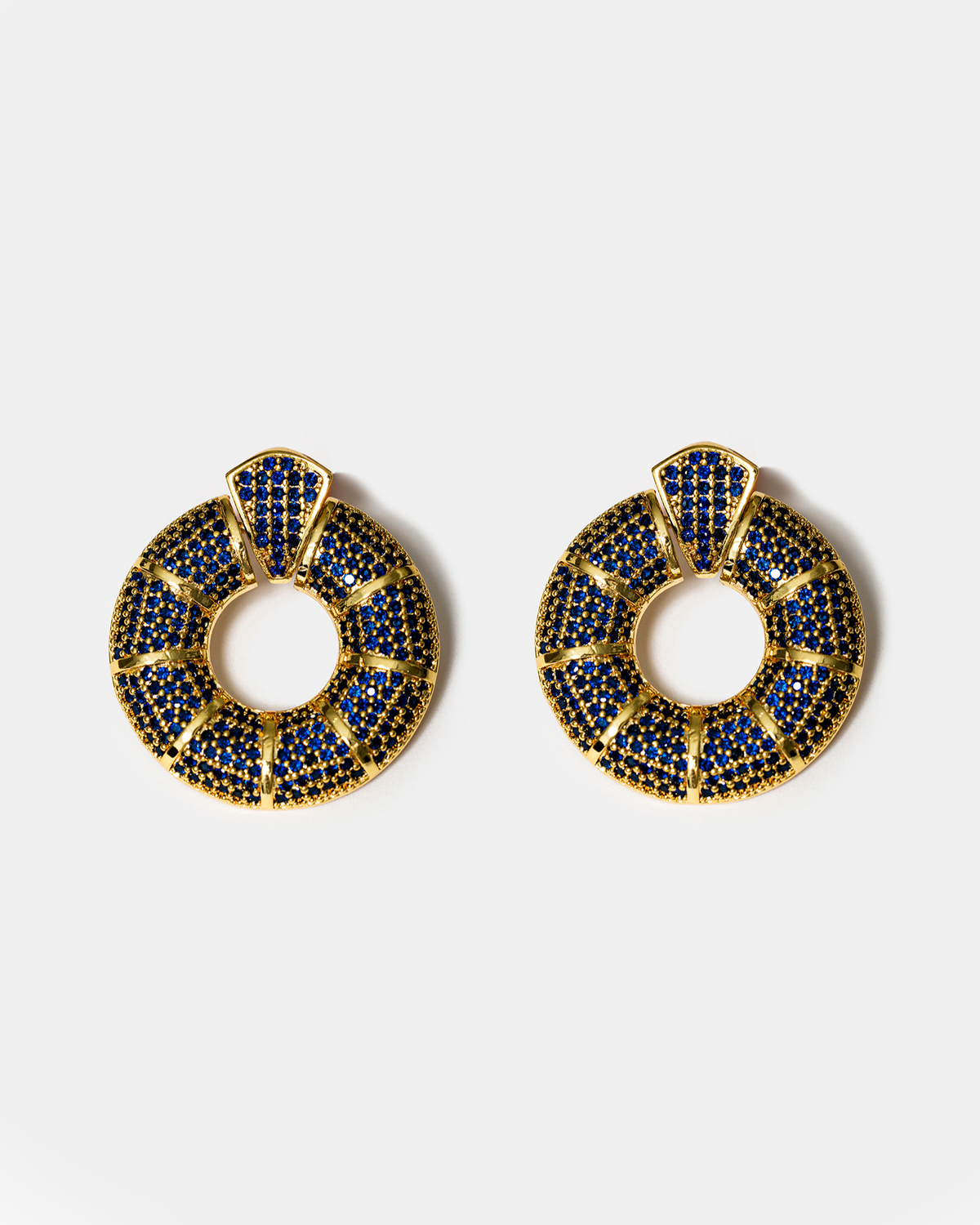 Blue zircon donut hoop earrings in gold-tone finish