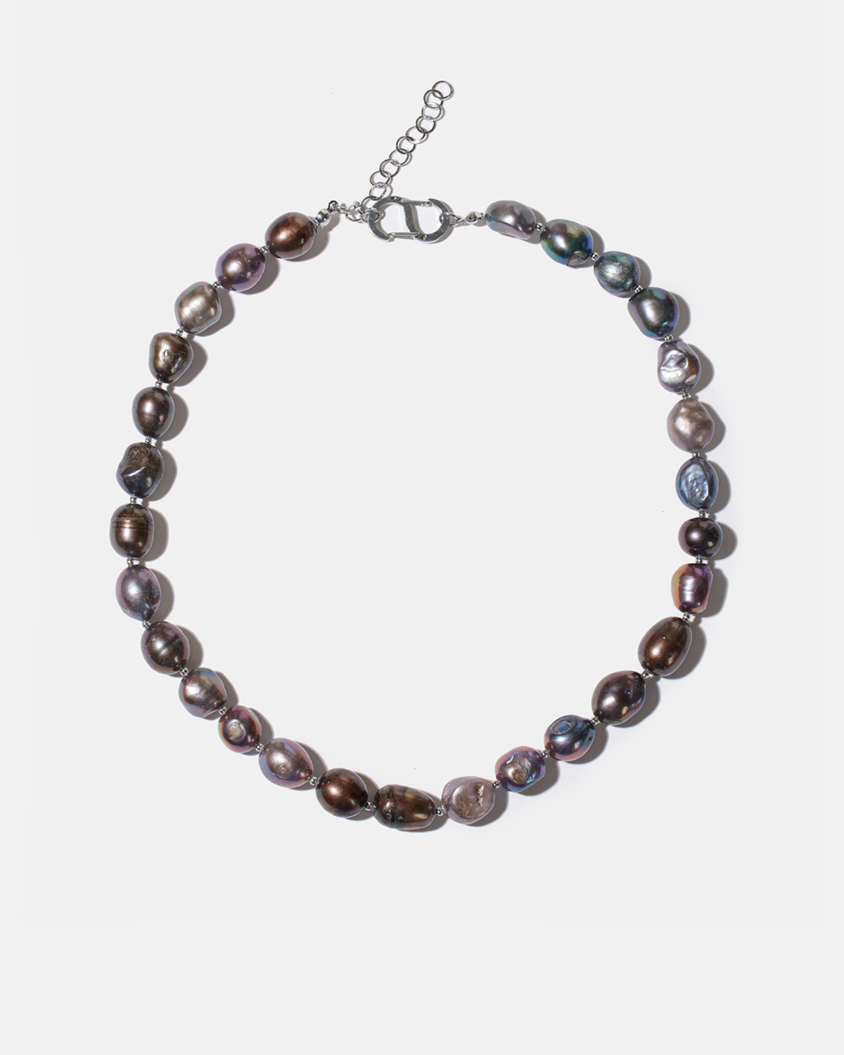 Dark baroque pearl necklace flatlay