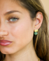 Soft green gemstone earrings portrait