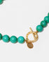Turquoise gemstone necklace with gold-tone clasp detail