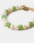 Freshwater pearl bracelet with green glass beads