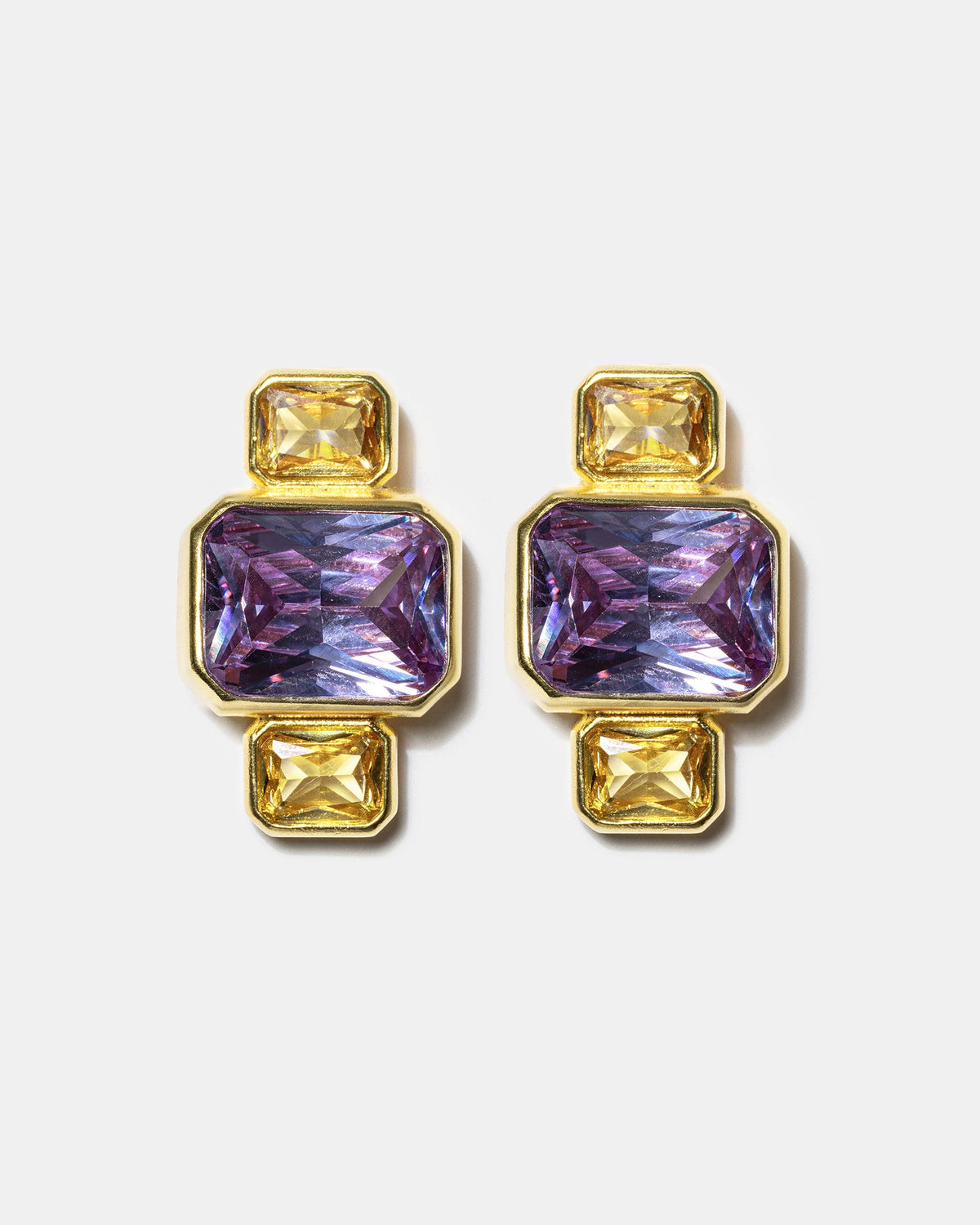 Gold geometric stud earrings with blue gemstones