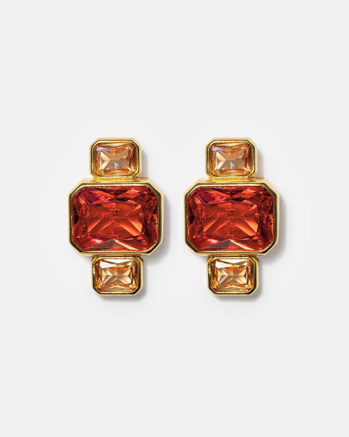 Gold geometric stud earrings with pink and amber gemstones