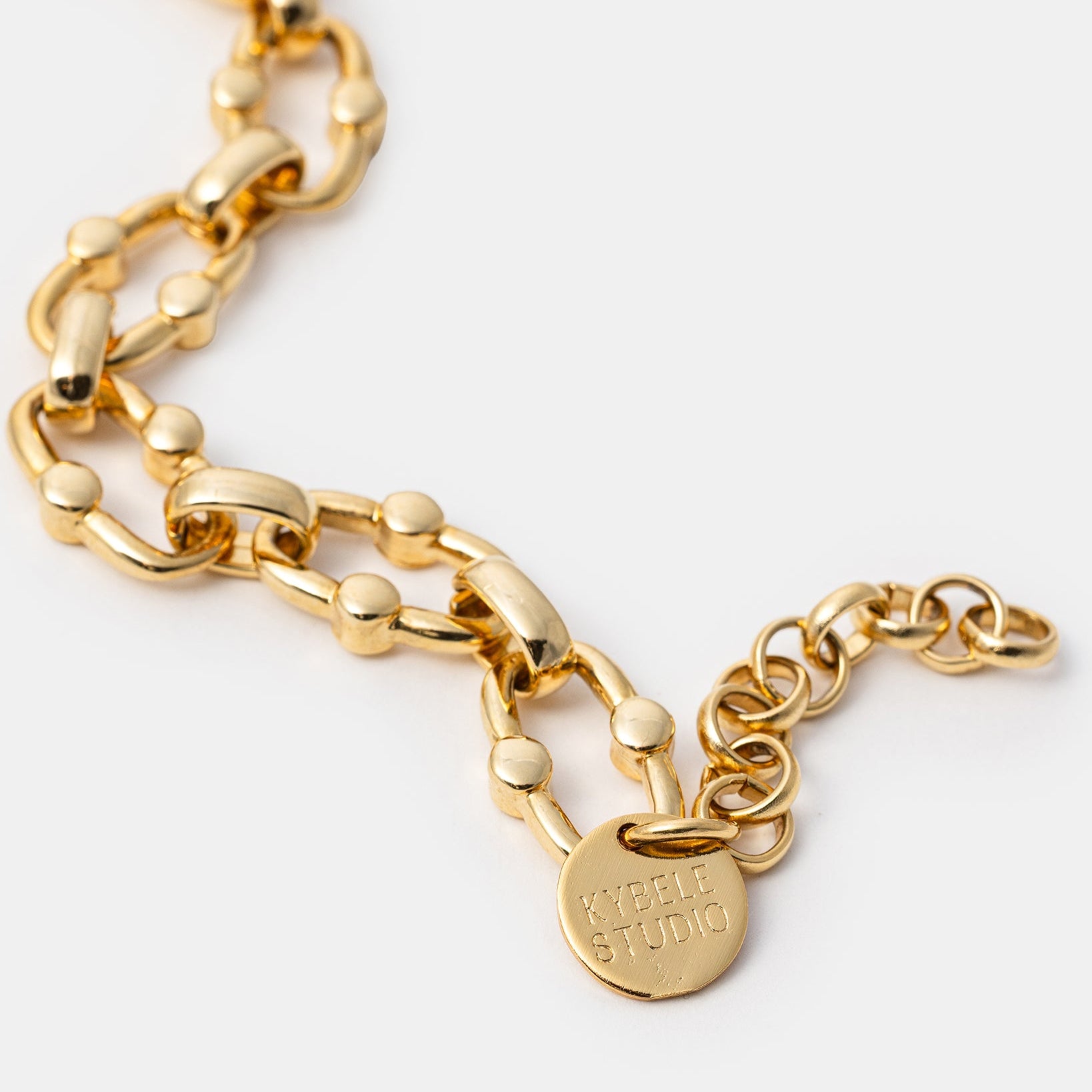 Bold gold chain bracelet close-up