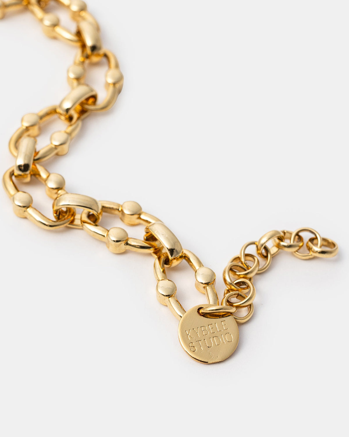 Bold gold chain bracelet close-up