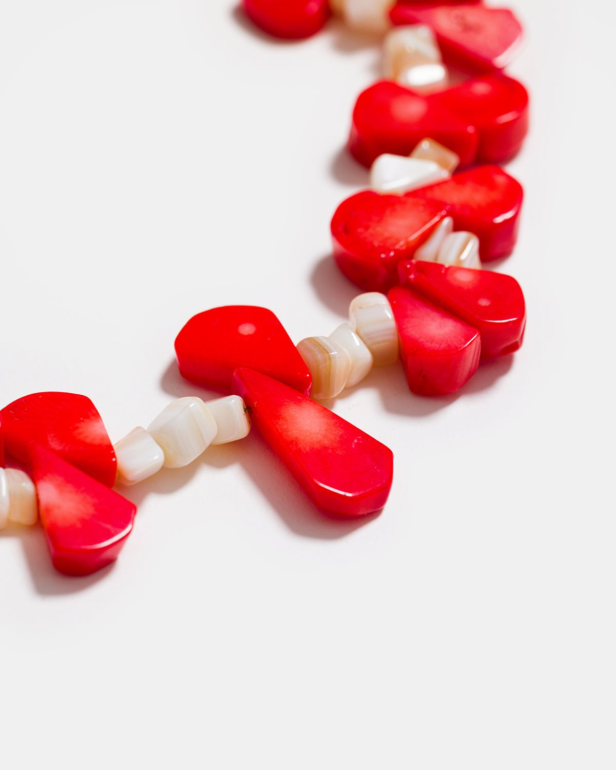 Red glass chili pepper charm detail