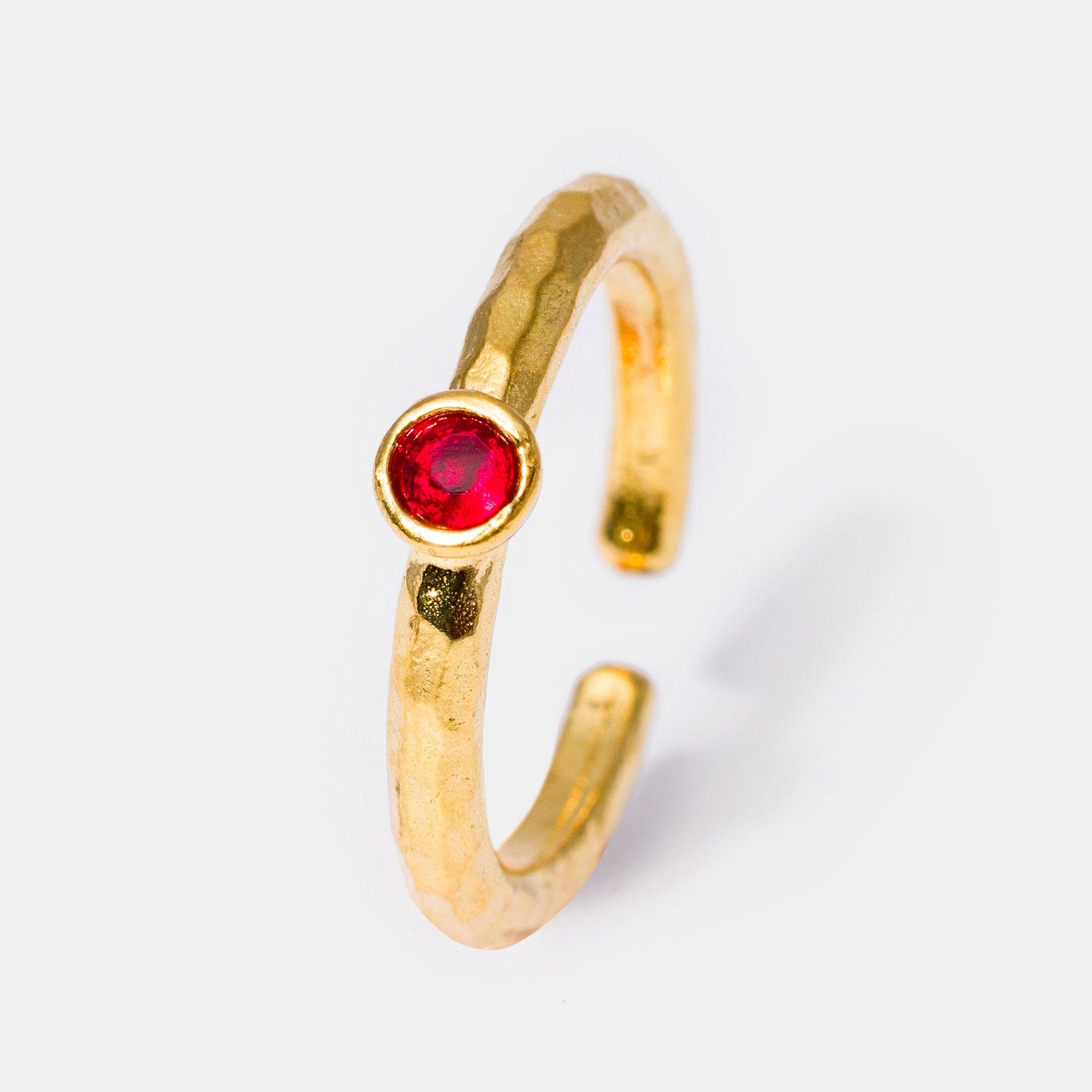 Gold ruby hammered gemstone ring