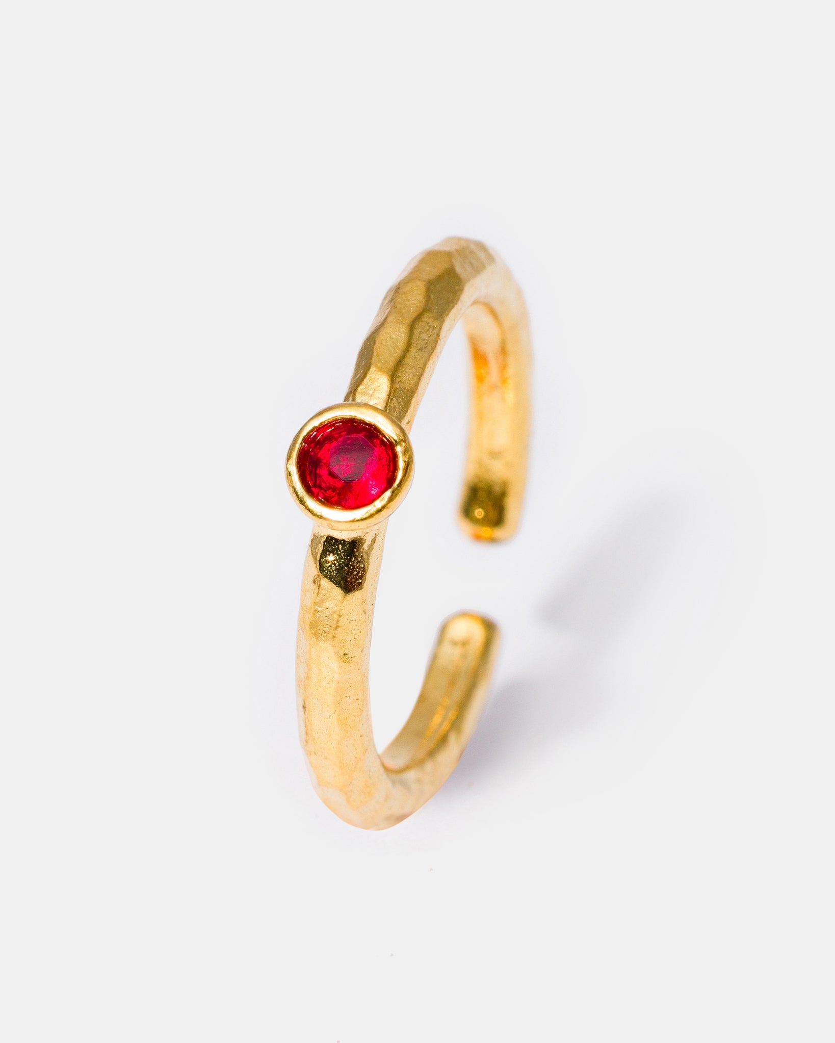 Gold ruby hammered gemstone ring