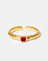 Adjustable hammered gold ruby ring