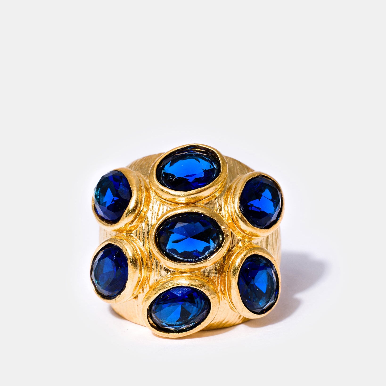 Gold sapphire multi-gemstone cocktail ring with oval blue stones