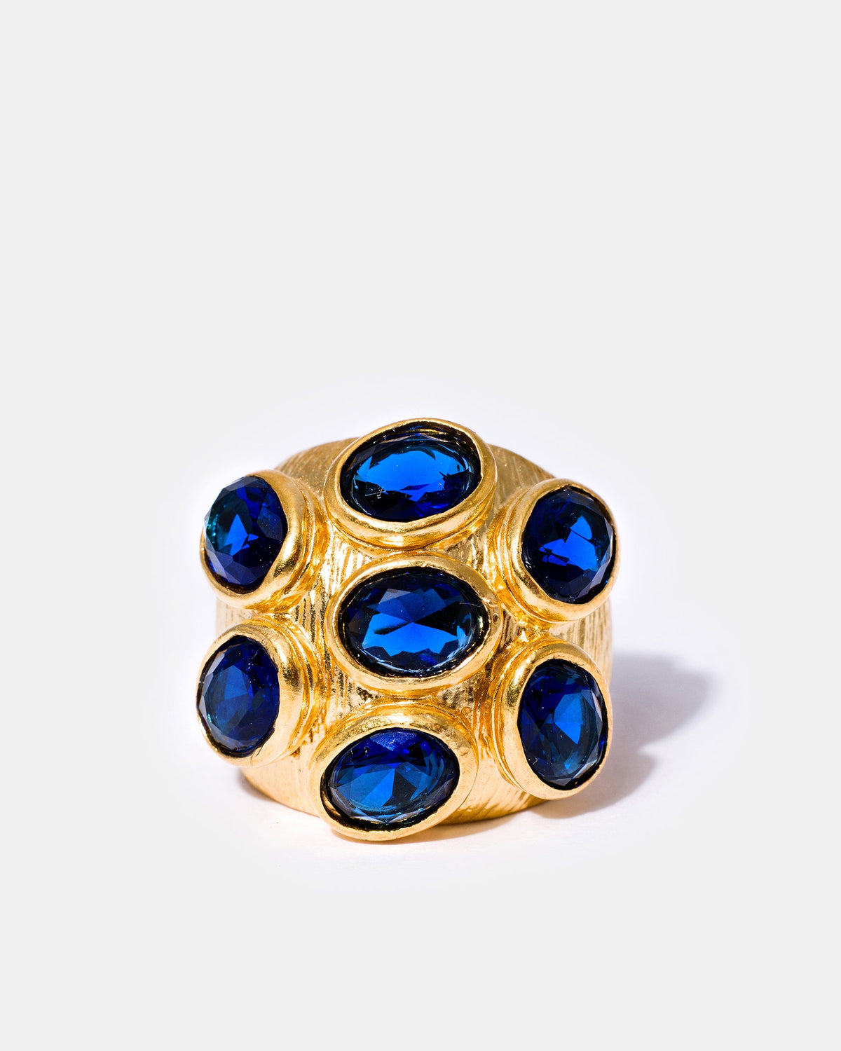 Gold sapphire multi-gemstone cocktail ring with oval blue stones