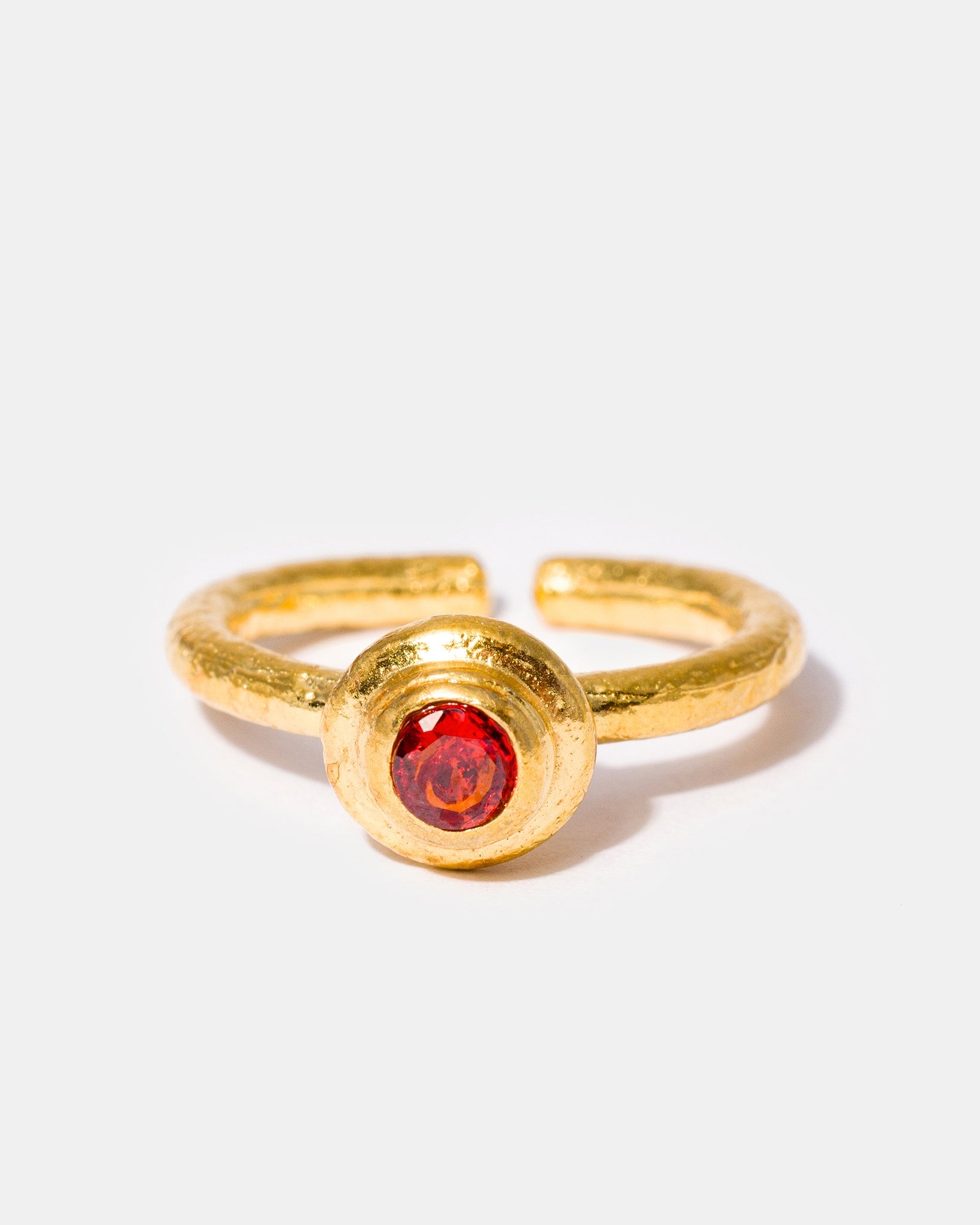 Gold gemstone ring with amber colored cubic zirconia