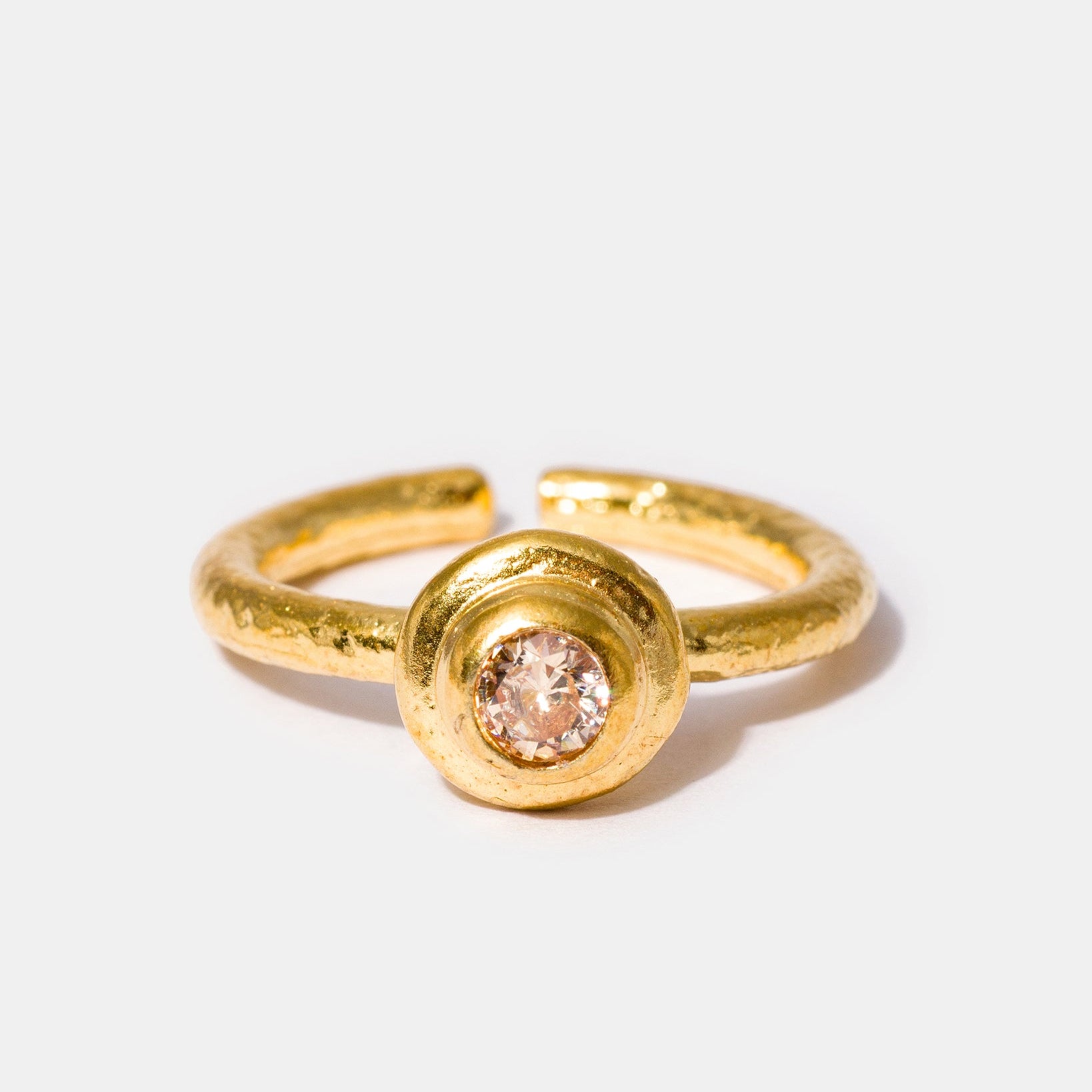 Gold gemstone ring with champagne cubic zirconia