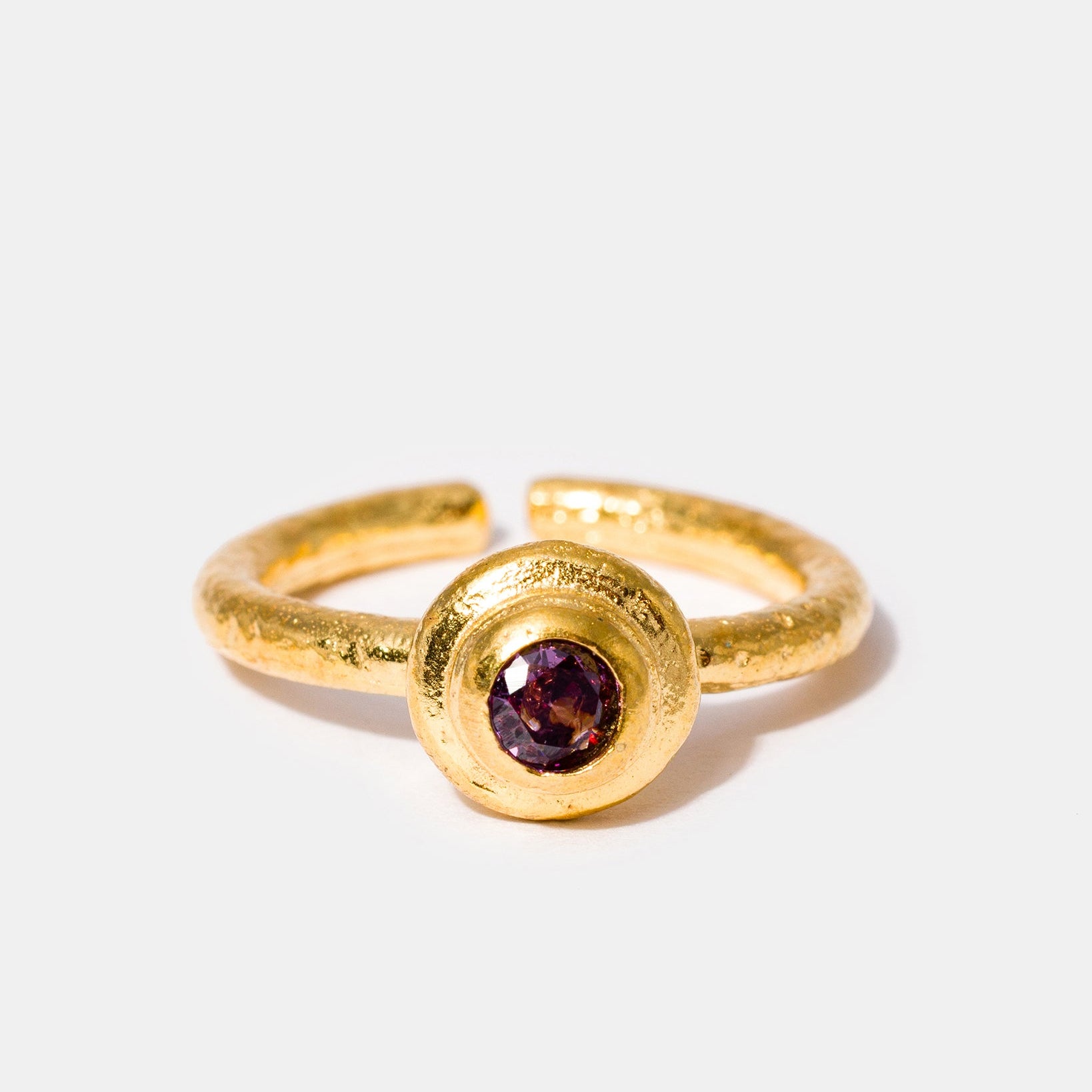 Gold gemstone ring with amethyst cubic zirconia