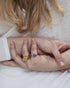 Woman wearing Sapphire Sky Cat's Eye ring in a minimalist jewelry styling