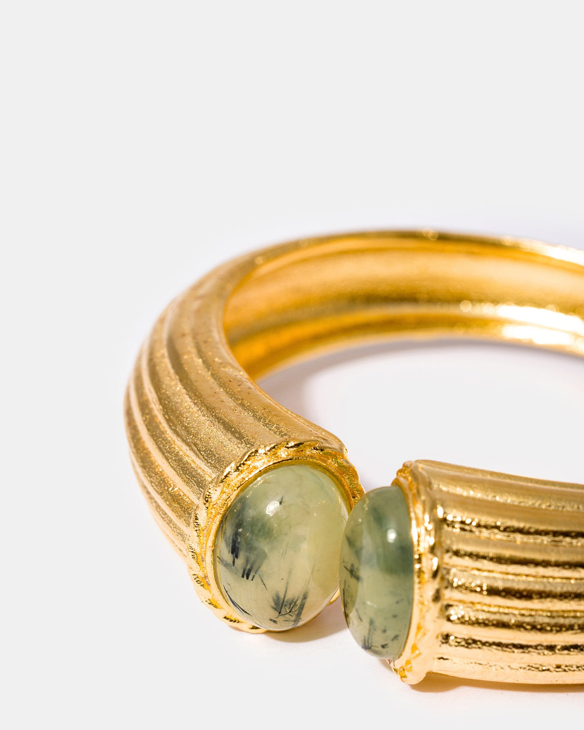 Sculptural prehnite bracelet close-up