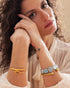 Woman wearing Textured Bamboo cuff bracelet in an elegant everyday style