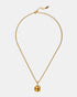 Full-length gold necklace with square citrine pendant