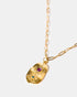 Gold talisman necklace with amethyst and blue stones