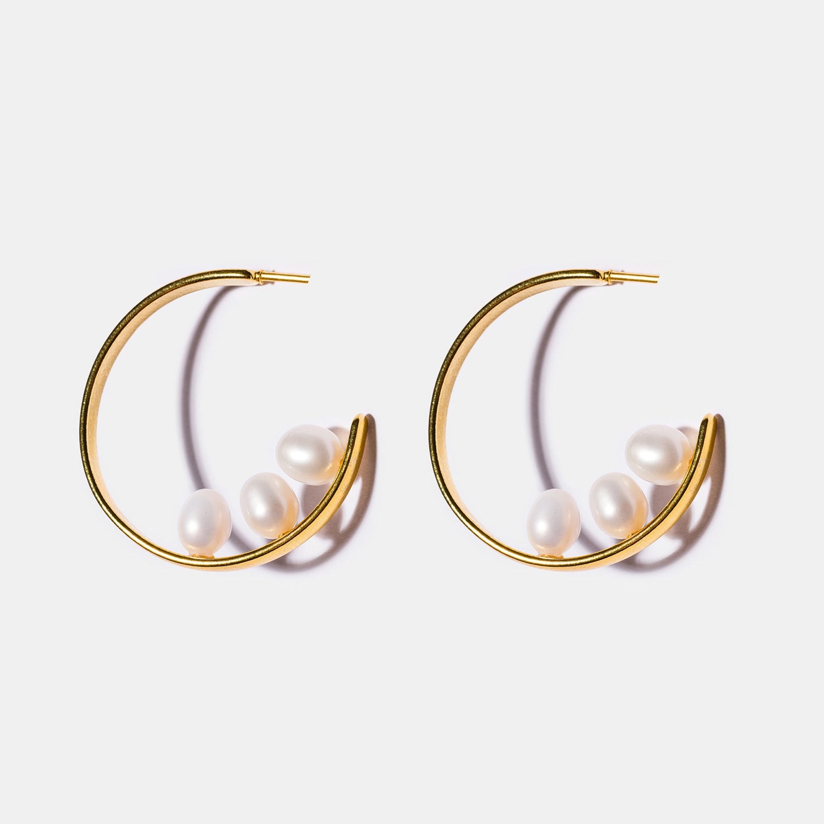 Freshwater pearl inside-out hoop earrings with 18k gold-plated brass and elegant pearl detailing