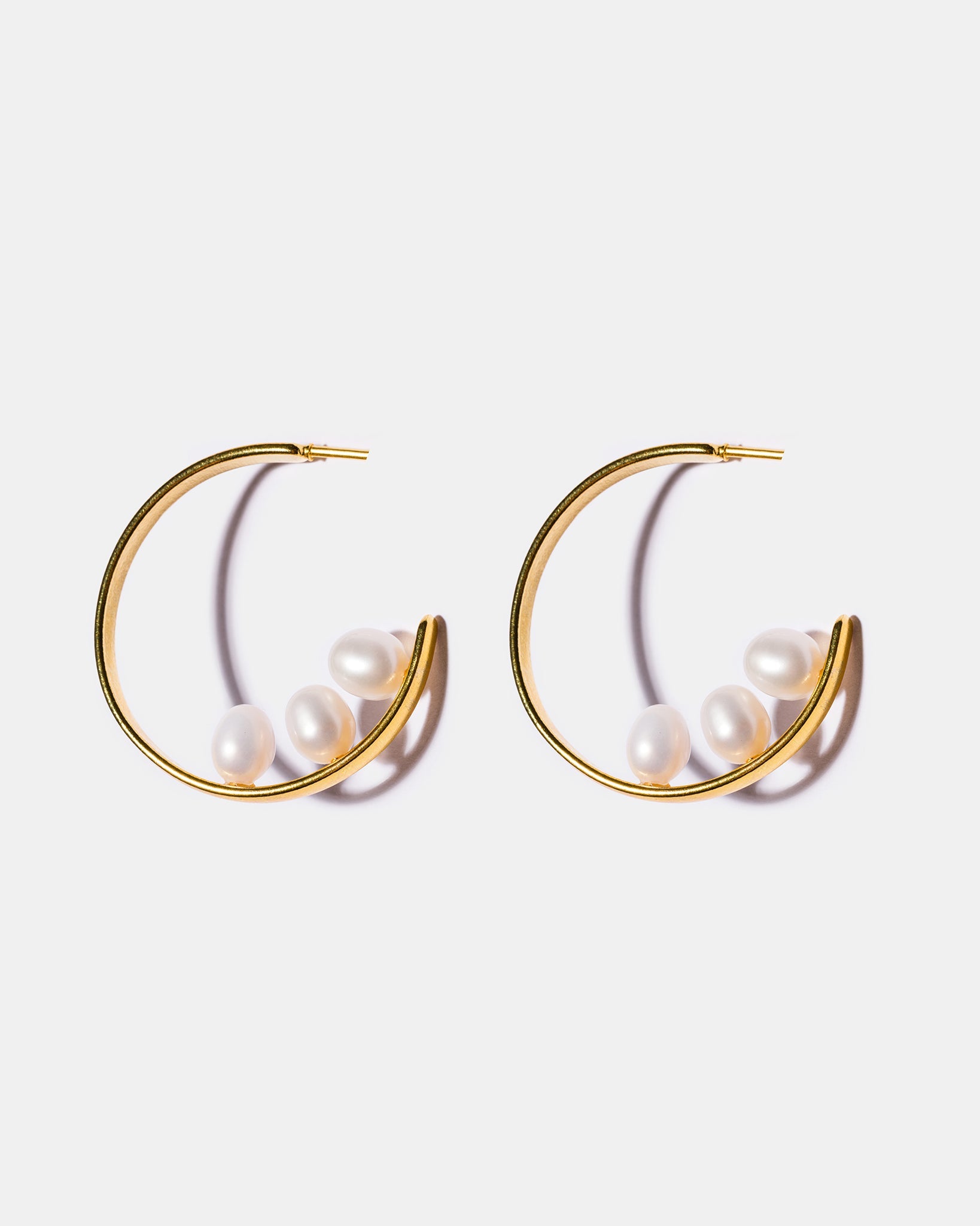 Freshwater pearl inside-out hoop earrings with 18k gold-plated brass and elegant pearl detailing
