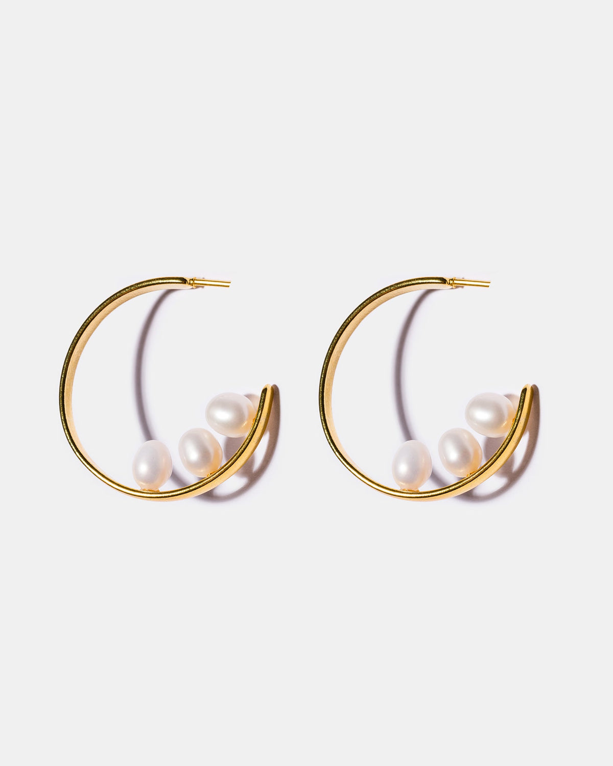 Freshwater pearl inside-out hoop earrings with 18k gold-plated brass and elegant pearl detailing