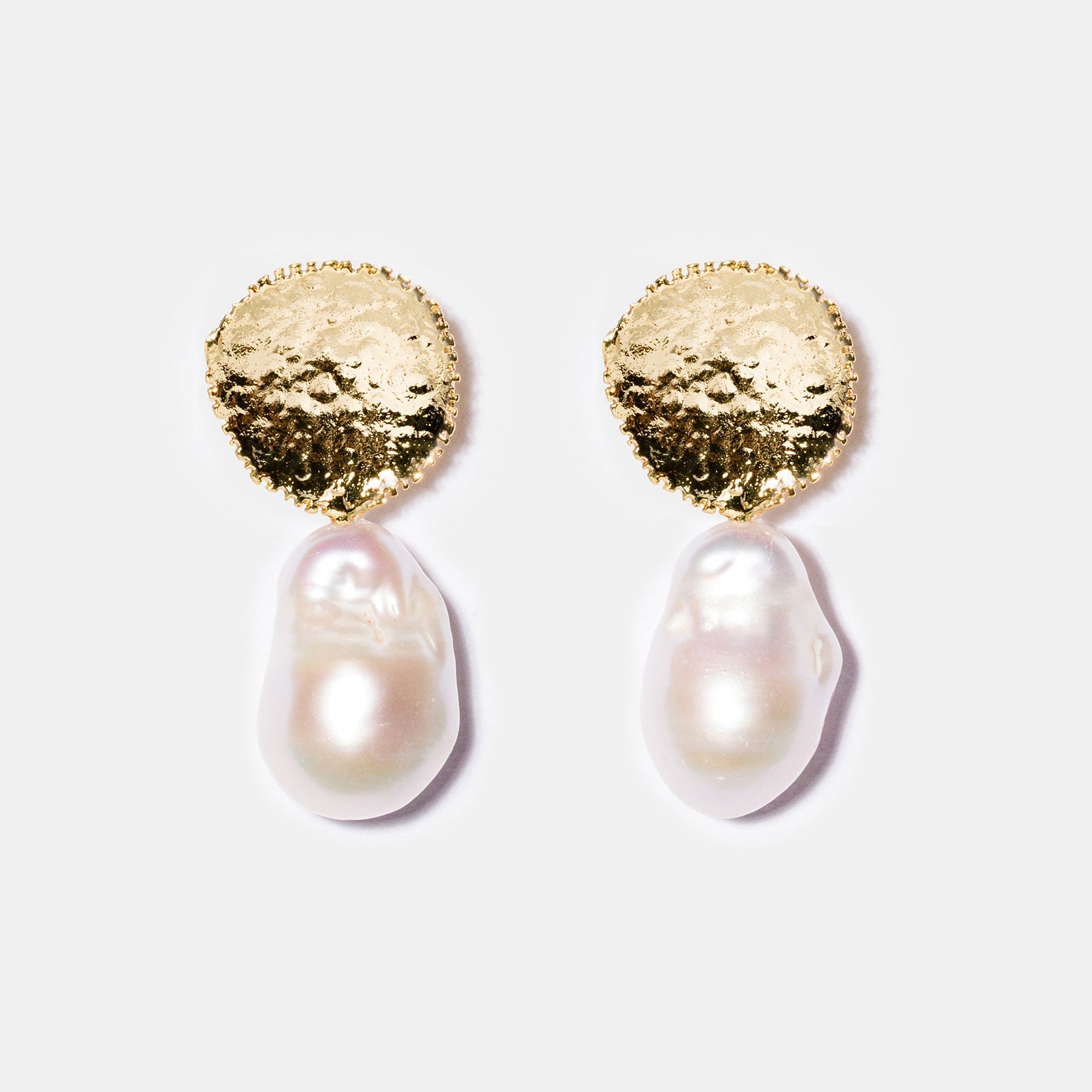 Baroque pearl drop earrings flatlay
