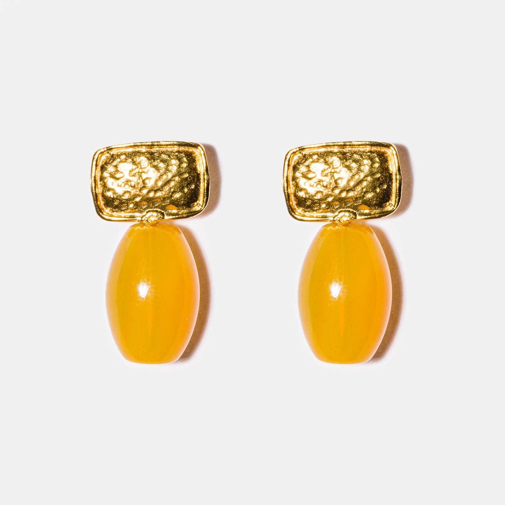 Yellow agate drop earrings flatlay