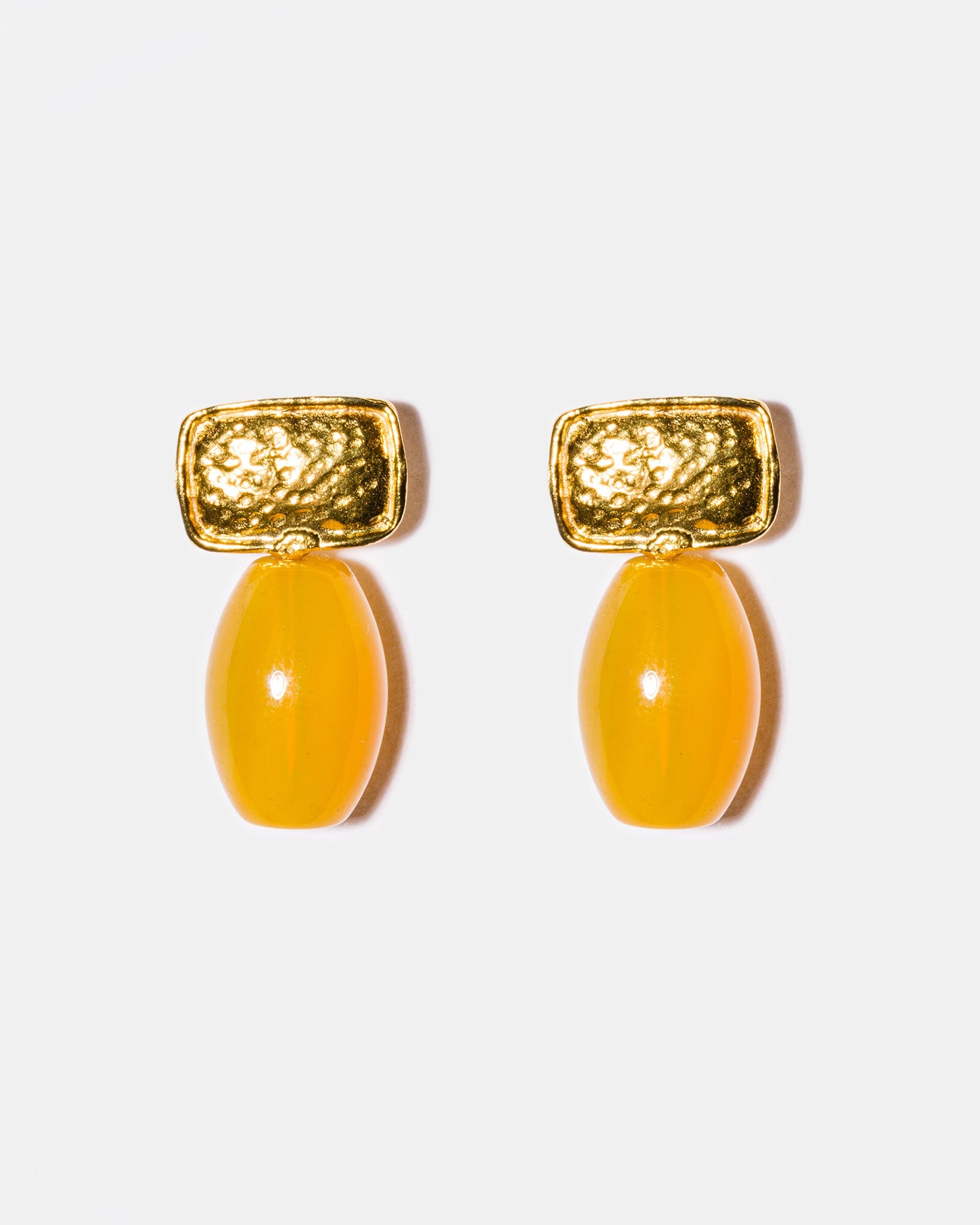 Yellow agate drop earrings flatlay