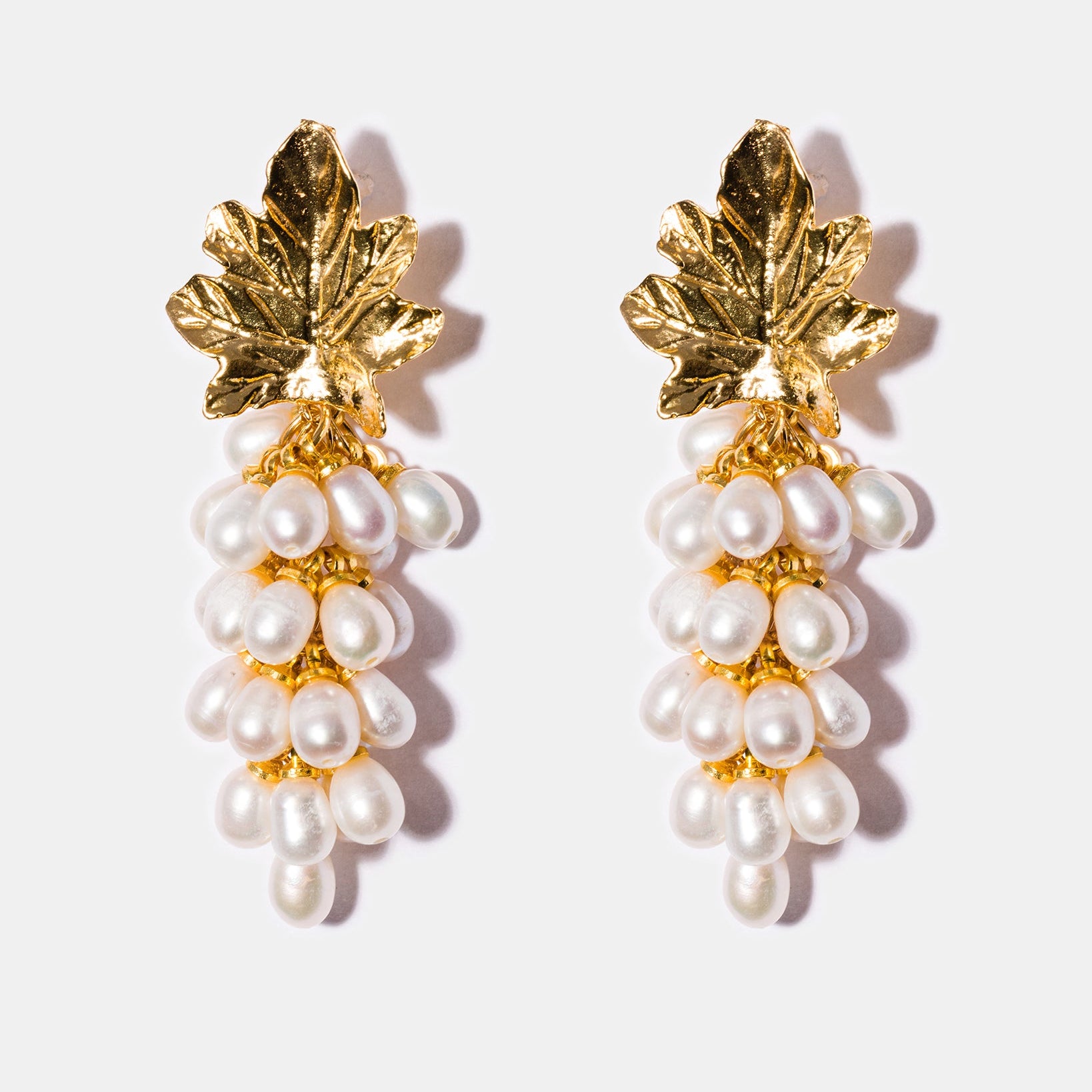 Freshwater pearl cluster earrings with textured gold leaf design and 18k gold-plated brass