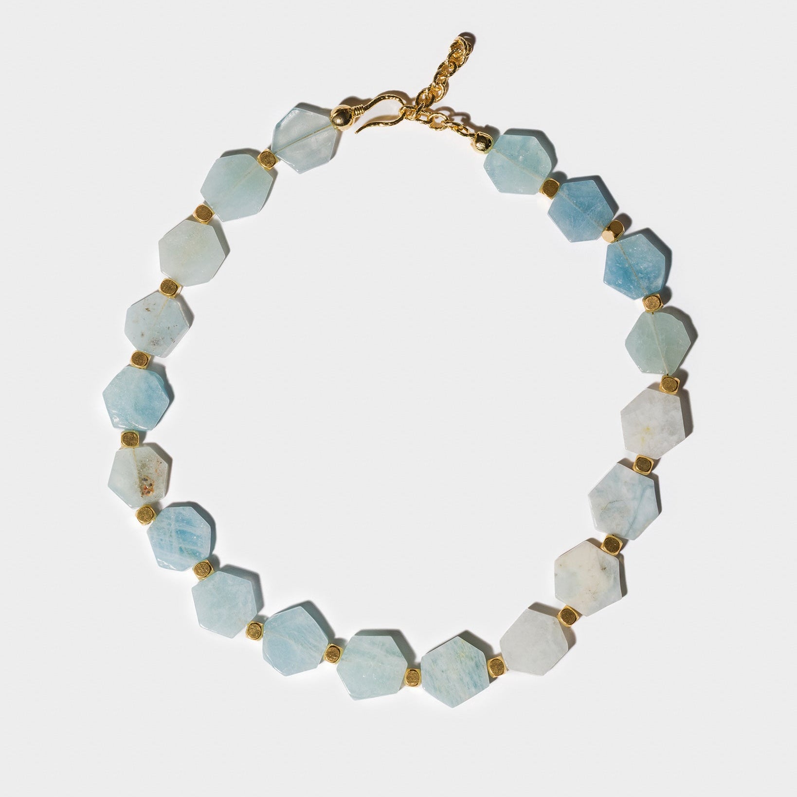 Aquamarine gemstone necklace with hexagonal blue beads and elegant gold-plated accents