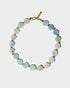 Aquamarine gemstone necklace with hexagonal blue beads and elegant gold-plated accents