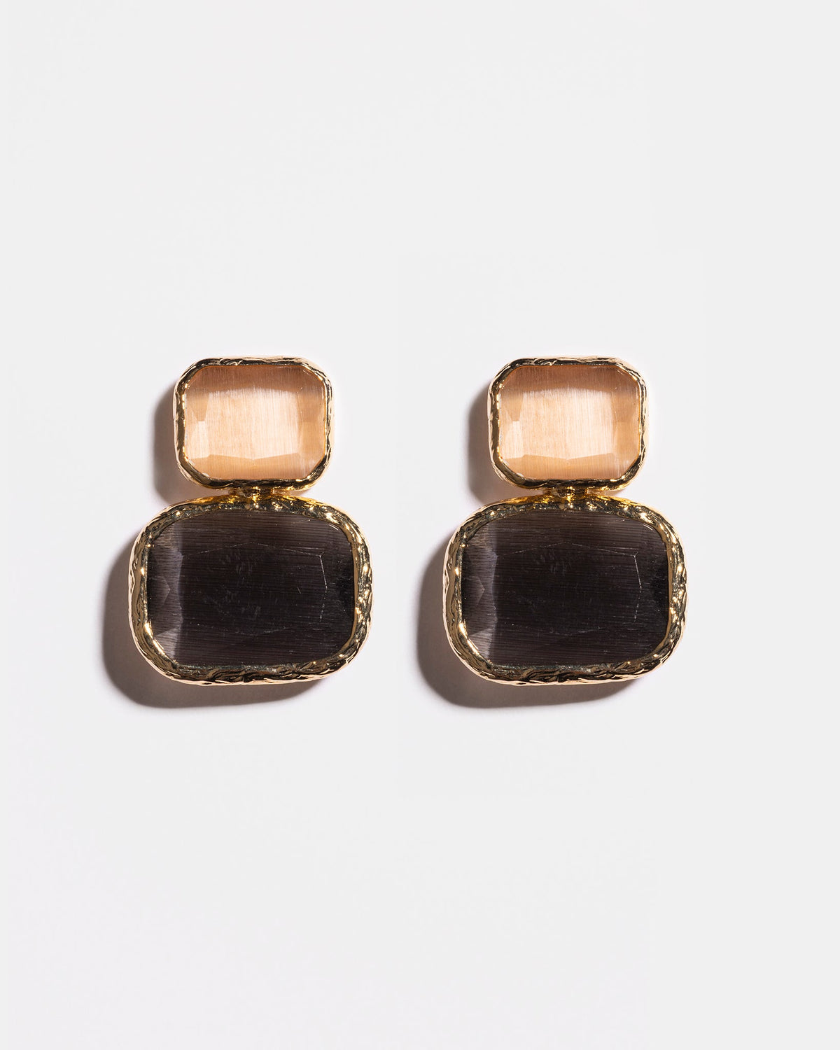 Anthracite and champagne Cat’s Eye earrings flatlay