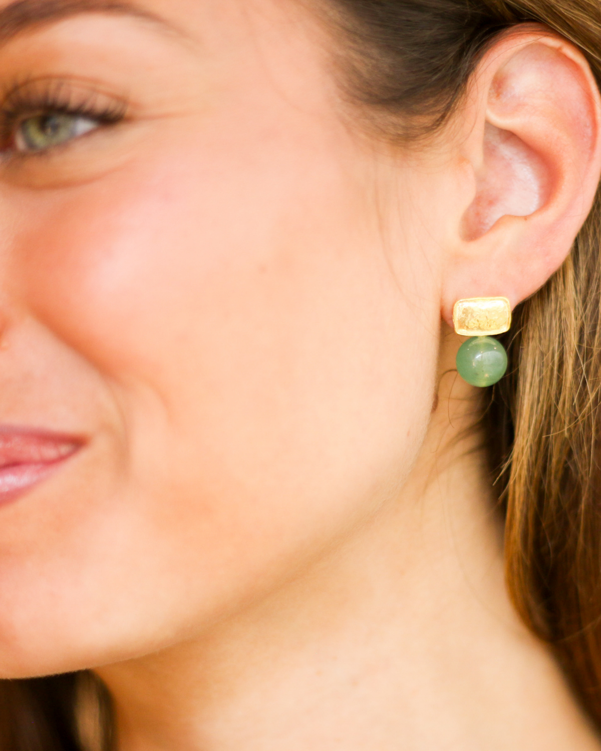 Elegant green stone earrings side profile