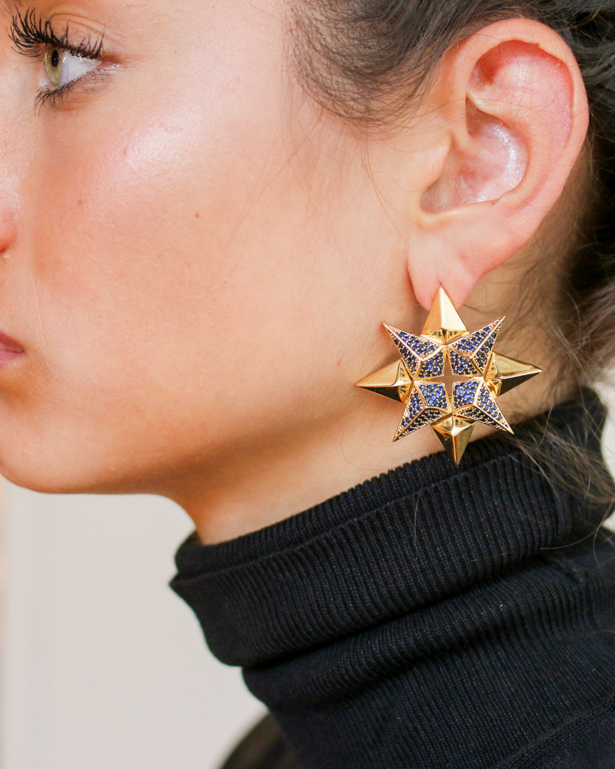 Sculptural sapphire earrings side profile