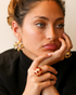Model wearing gold blush cocktail ring