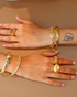 Hand-finished gold cuff detail