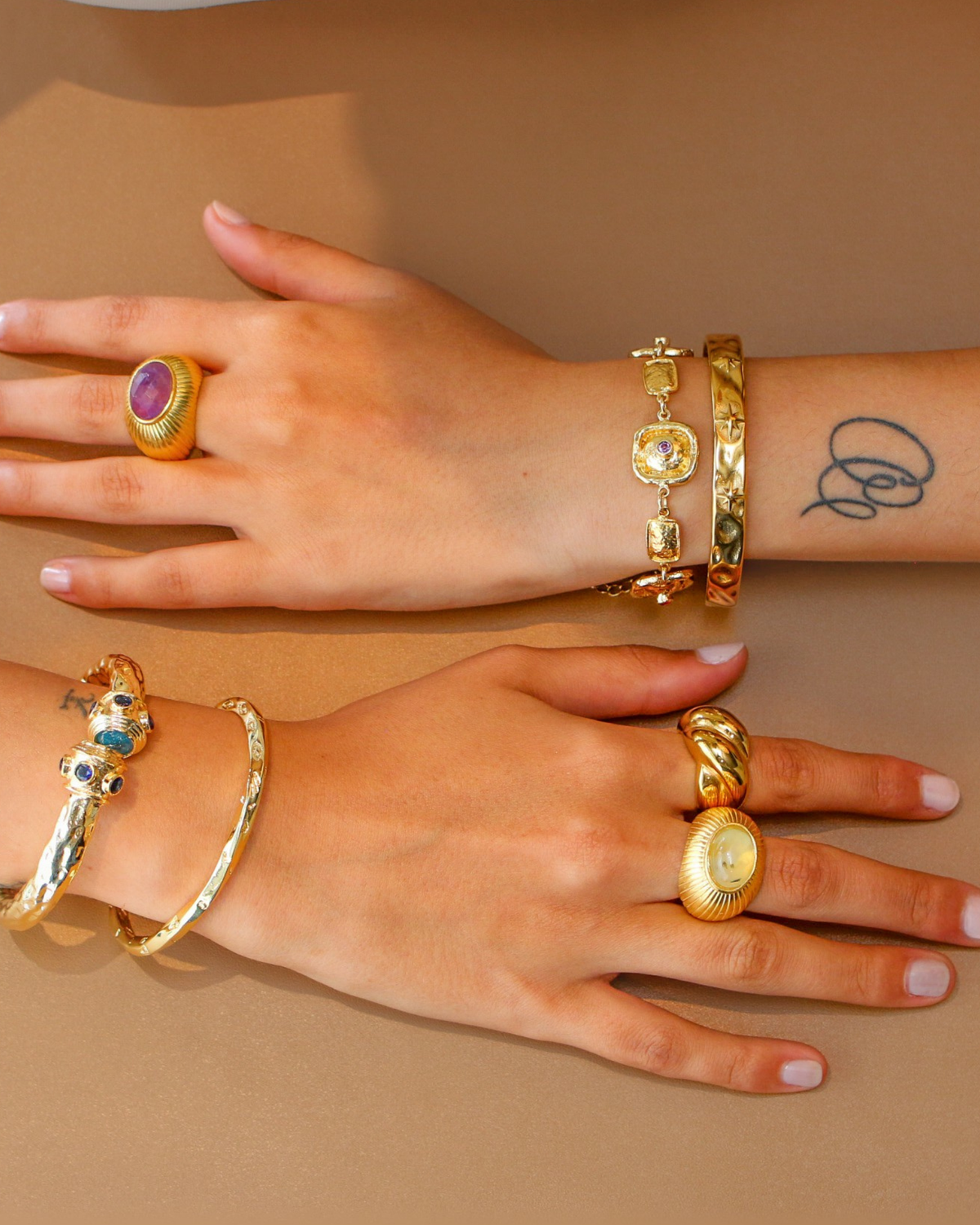 Hand-finished gold cuff detail