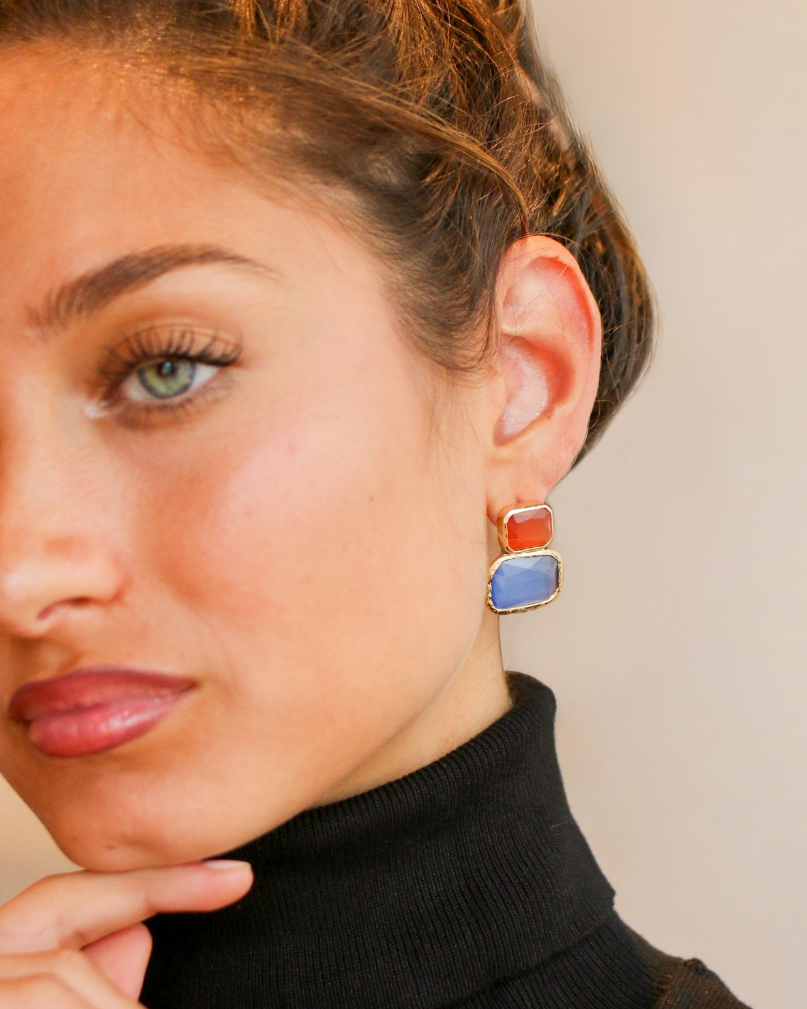 Vibrant gemstone earrings portrait