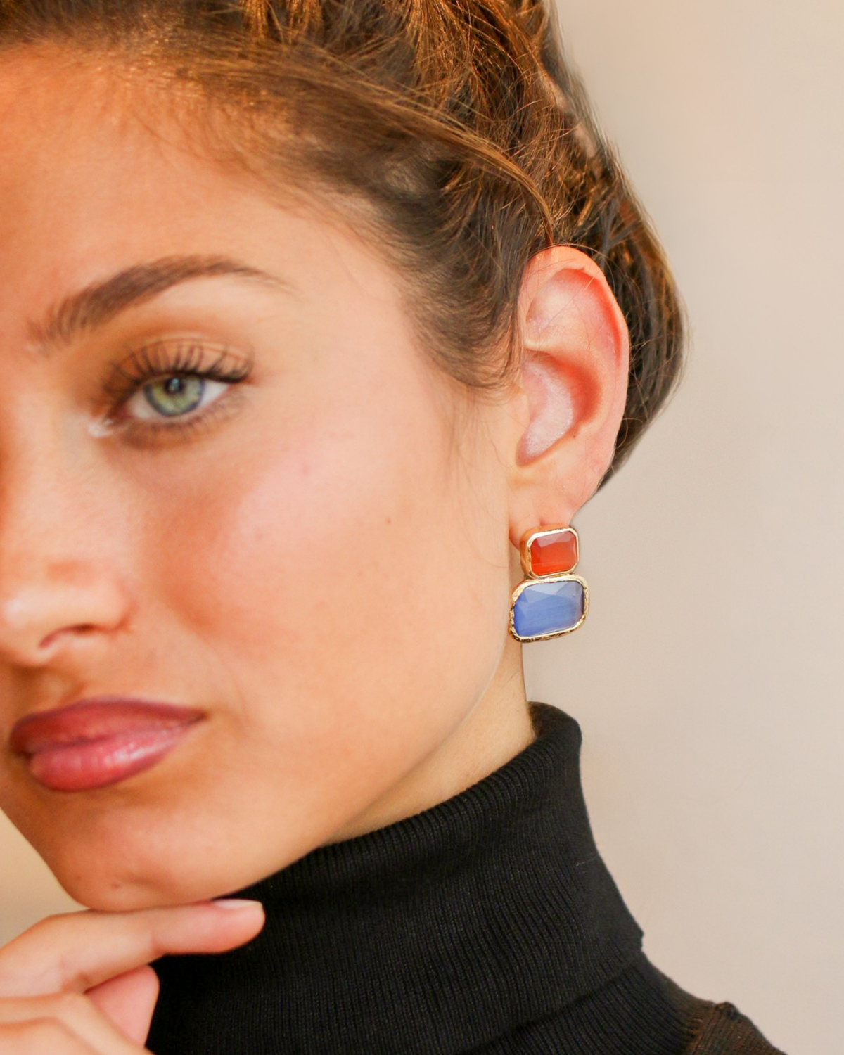 Vibrant gemstone earrings portrait