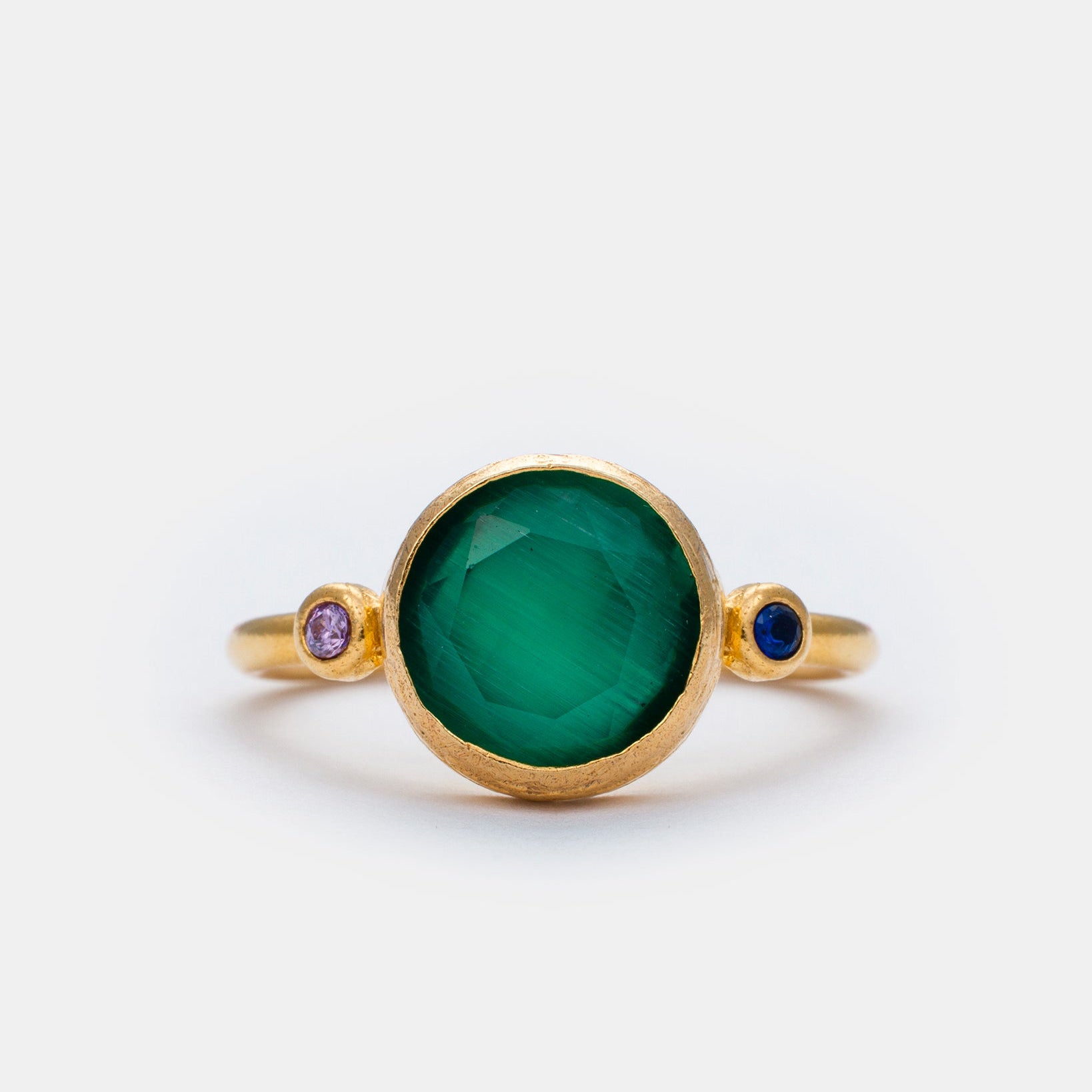Emerald Horizon Cat's Eye adjustable ring with green cat eye stone and zircon accents