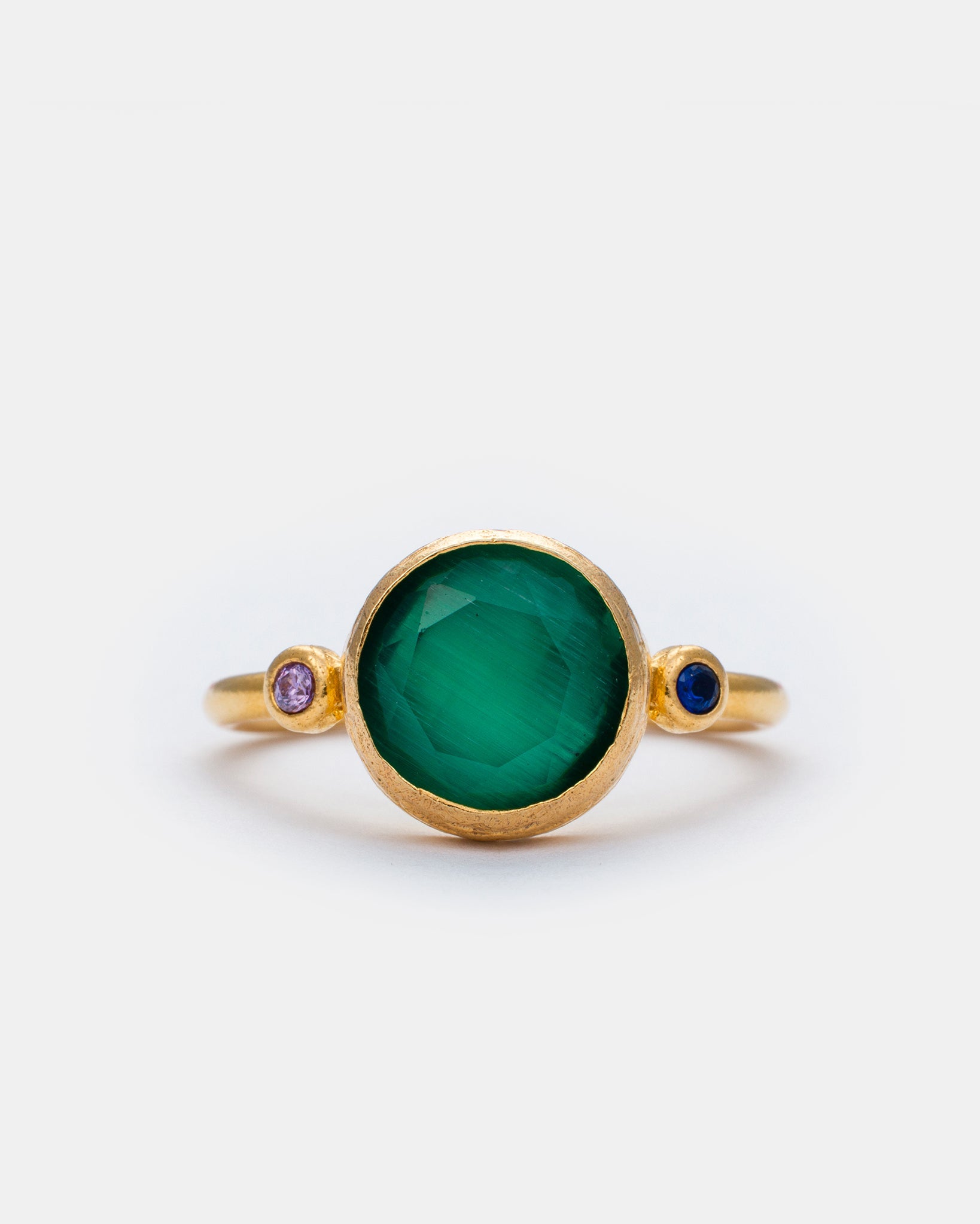 Emerald Horizon Cat's Eye adjustable ring with green cat eye stone and zircon accents