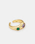 Close-up side view of gold-plated Celestial Glow ring highlighting zircon stone placement