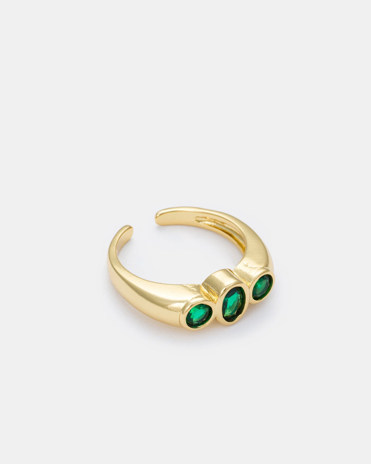 Close-up side view of Trinity Spark ring showcasing triple green zircon details
