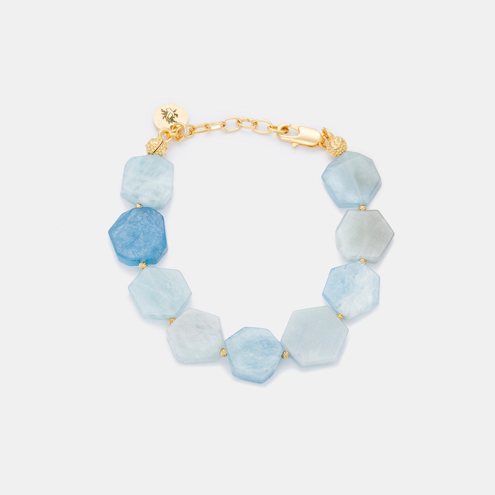 Hexagonal aquamarine gemstone bracelet with gold-plated accents