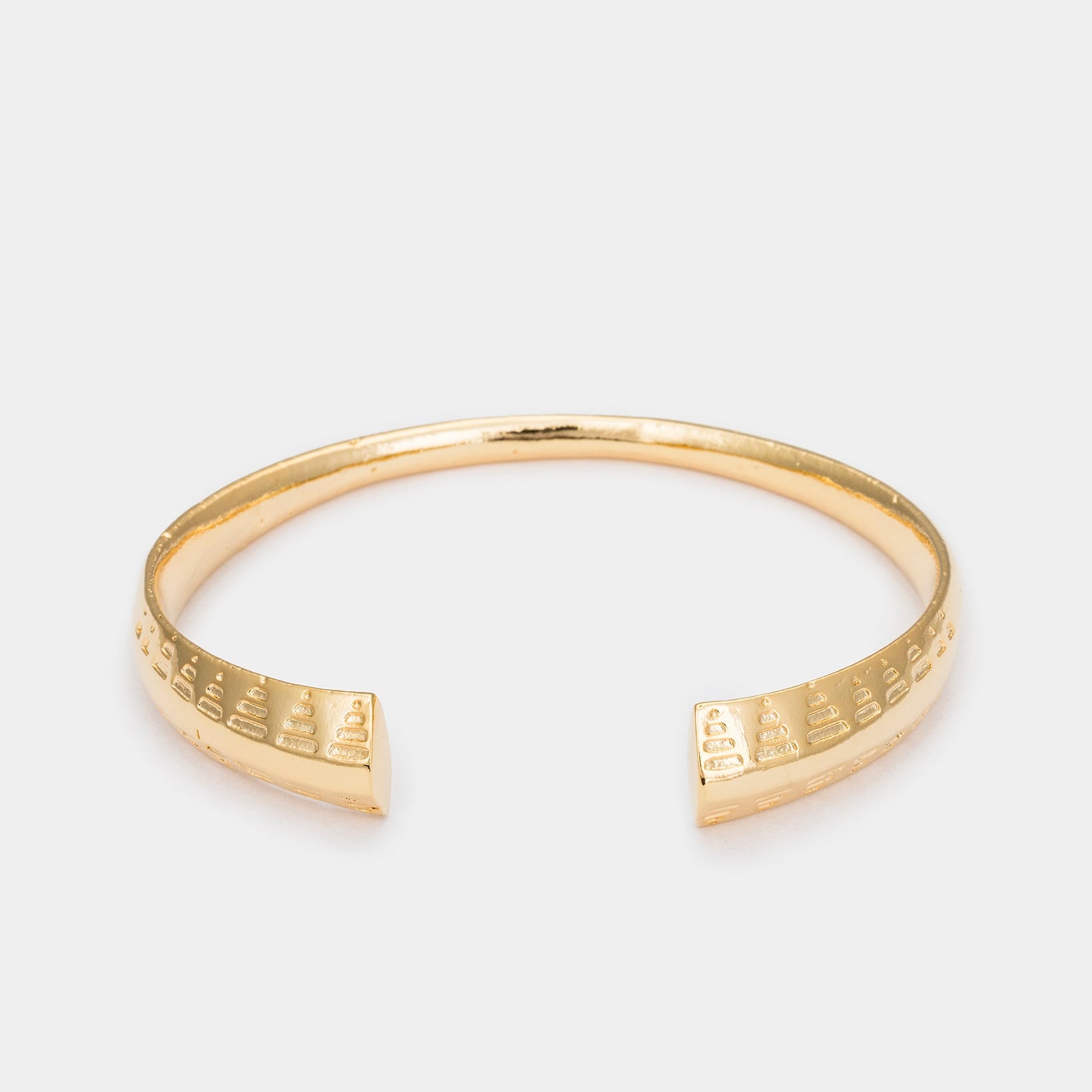 Inscribed Minimalist gold-plated cuff bracelet featuring engraved geometric patterns